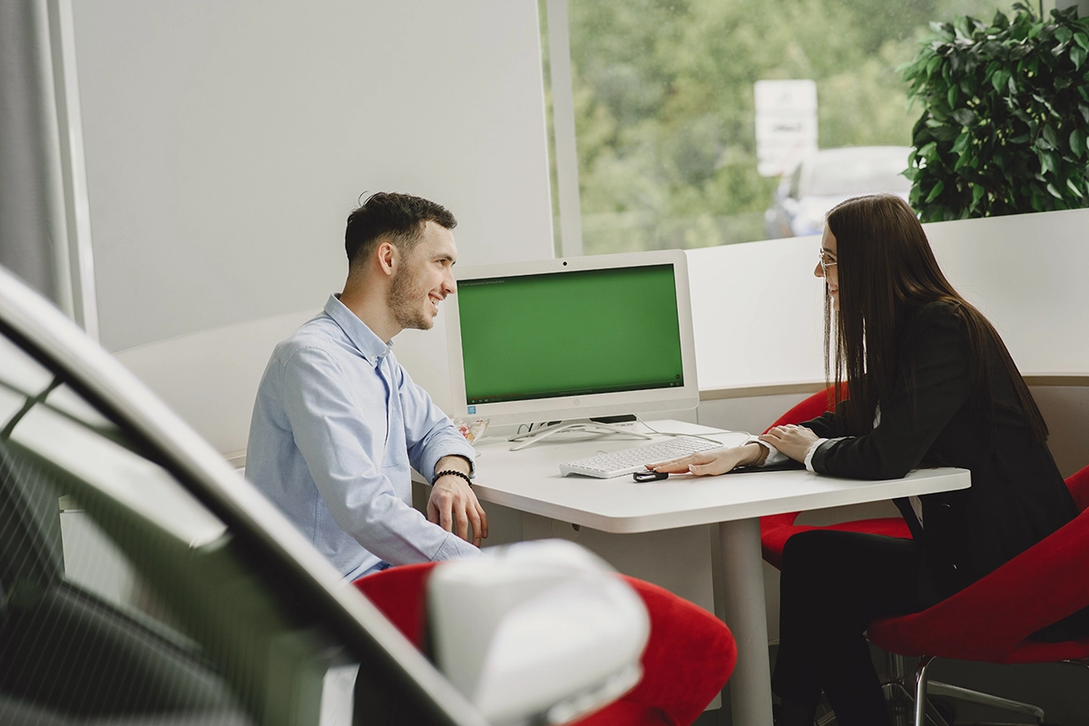 Collaborative Strategy – Sales Consultant Meeting with a Customer in an Office Sales_consultant_customer_meeting_Managed_Services_Australia