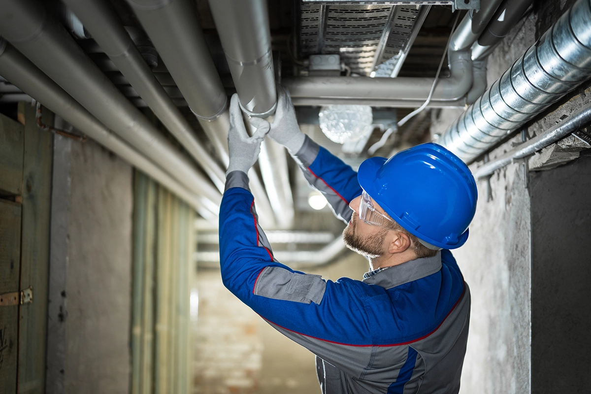 Plumber Repairing a Pipe: Unleashing Efficiency in the Trade Services Industry